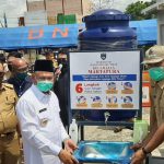 Cegah Covid, Pemkab OKUT Bagi Masker dan Tandon Air ke 20 Kacamatan Cegah Covid, Pemkab OKUT Bagi Masker dan Tandon Air ke 20 Kacamatan