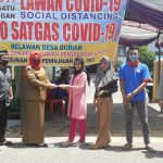 Penyemprotan Disinfektan dan Gerakan 1.000 Masker di Desa Durian OKU Penyemprotan Disinfektan dan Gerakan 1.000 Masker di Desa Durian OKU