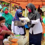 Tim Satgas Covid19  terus Lakukan Sosialisasi Jaga Jarak dan Bagikan Masker di Pasar BHL