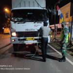 Masuk Pintu Gerbang Muba Suhu Tubuh Wajib Dicek, Kendaraan Disemprot Desinfektan