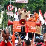 Naik Ojol, Deru Gabung Demo Buruh di DPRD Sumsel