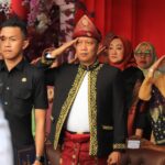 Mengenakan Pakaian Adat, Pemko Palembang pada Hardiknas Tekankan Pendidikan Berkualitas
